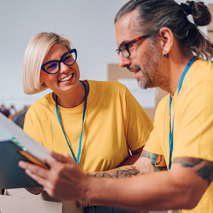 two-team-members-working-together.jpg